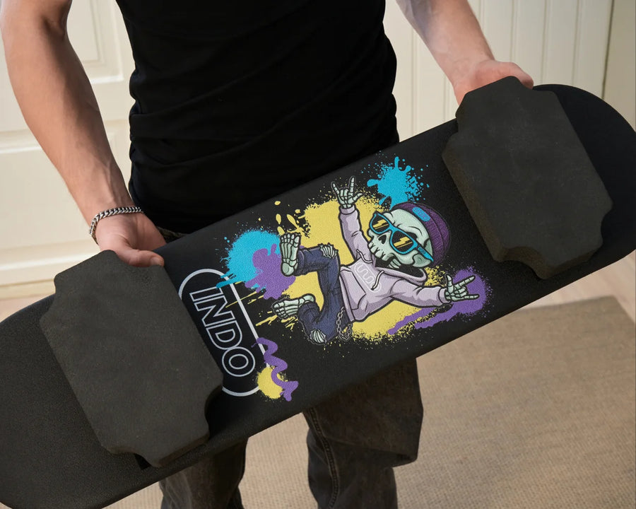 Holding the INDO Skate with the foam truck pads fitted