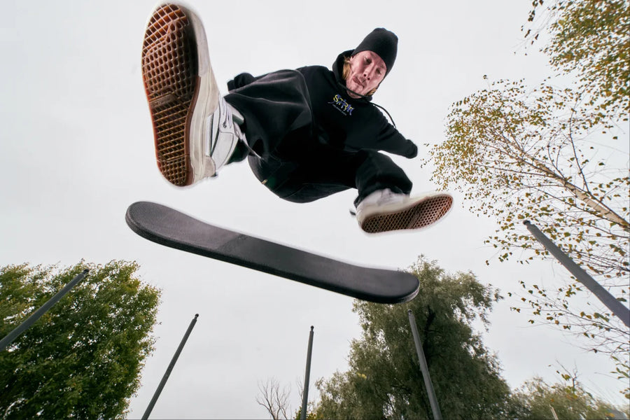 Rider mid-trick above the INDO Skate